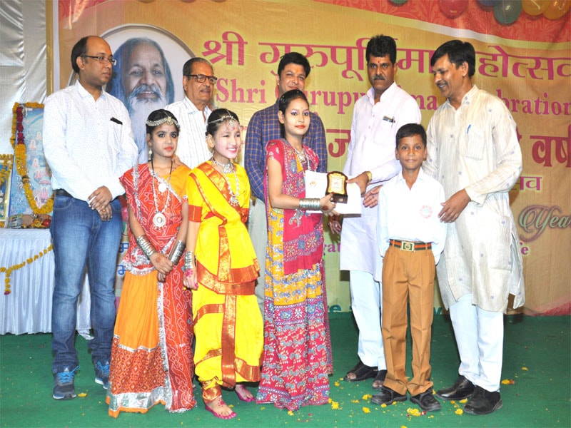 honble mla has honoured with special award to of mvm shajapur students for dance performance