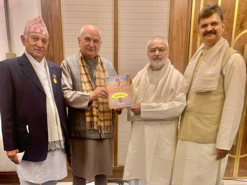 Brahmachari Girish Ji has presented his book ''Param Pujya Maharishi Mahesh Yogi ji ki Deviya Chhatra Chhaya mein Brahmachari Girish'' to world famous respected Vaidyaraj (Dr.) Shri Devendra Triguna Ji.